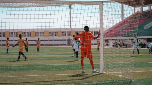 Guarda-redes de futebol em ação num campo